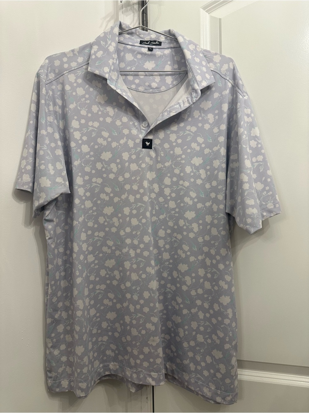 Bad Birdie Light Lavender Floral Golf Polo.
Size XL
Perfect for Fathers Day!
